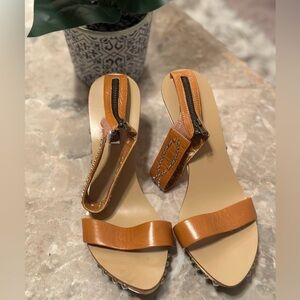 Pecan Brown heeled sandals.